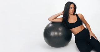 Woman wearing non-toxic TENCEL leggings and sports bra